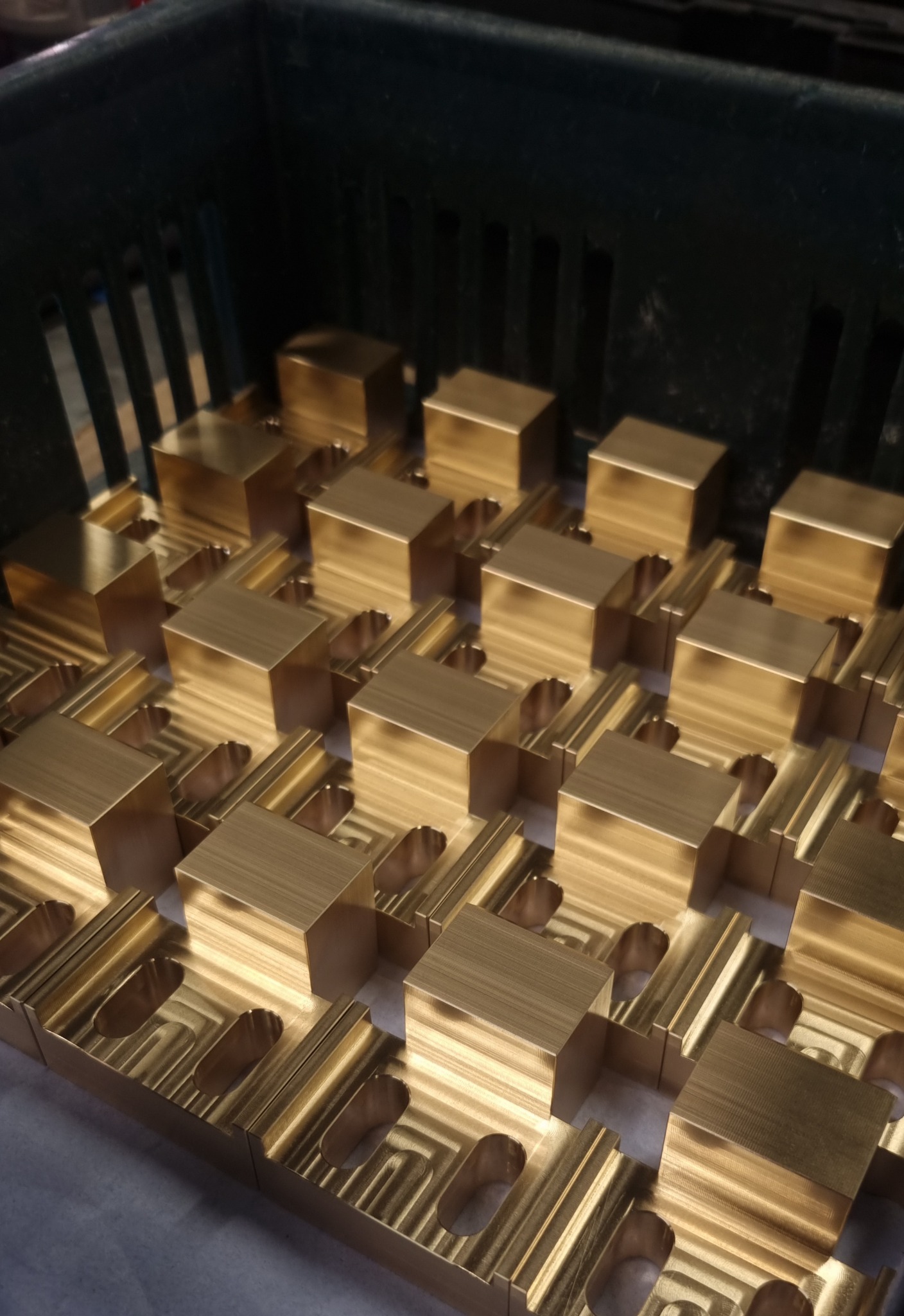 Batch of precision machined brass components